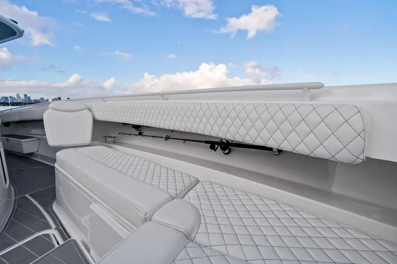 Slide: The Image of Luxurious seating on 2023 HCB 42 Lujo boat with quilted upholstery and scenic view. - 33