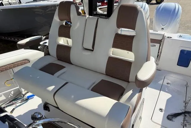 Slide: The Image of 2026 Tidewater 302 CC Adventure boat with comfortable seating and modern design. - 8