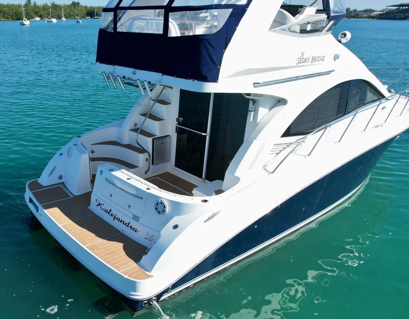 Slide: The Image of 2007 Sea Ray 360 Sedan Bridge yacht on clear blue water. - 21