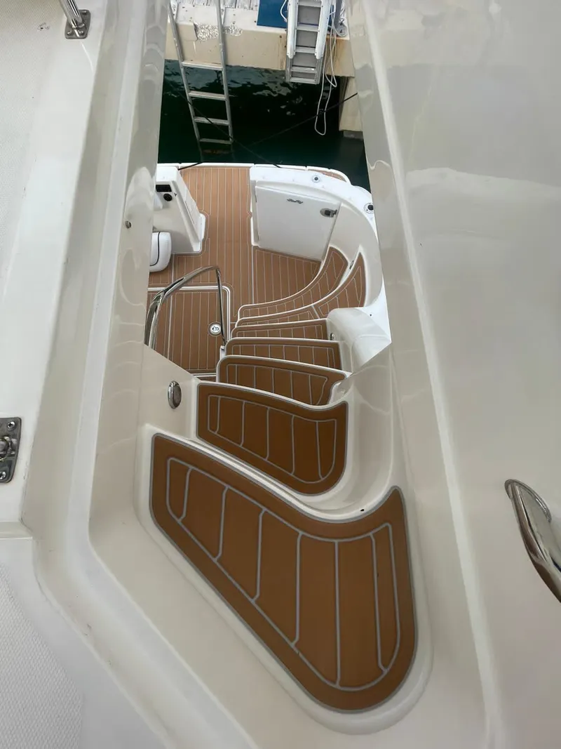 Slide: The Image of Staircase on 2007 Sea Ray 360 Sedan Bridge yacht, featuring teak flooring. - 27