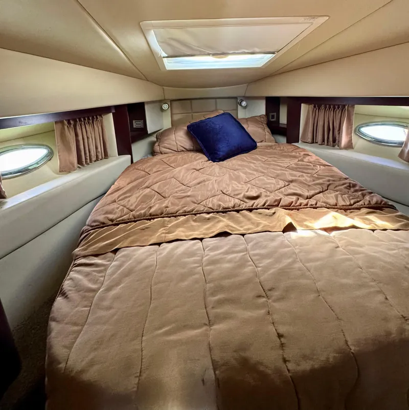 Slide: The Image of 2007 Sea Ray 360 Sedan Bridge cabin with cozy bed and skylight. - 33