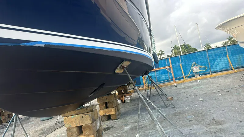 Slide: The Image of 2007 Sea Ray 360 Sedan Bridge yacht on dry dock, supported by stands and blocks. - 40