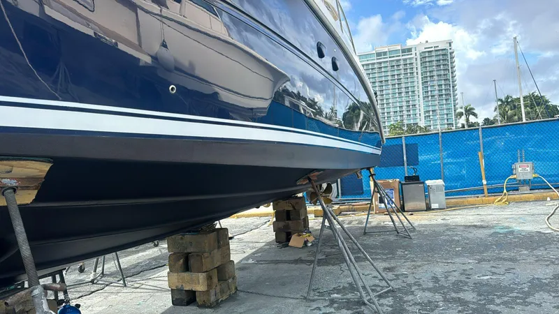 Slide: The Image of 2007 Sea Ray 360 Sedan Bridge yacht on dry dock, supported by blocks and stands. - 41
