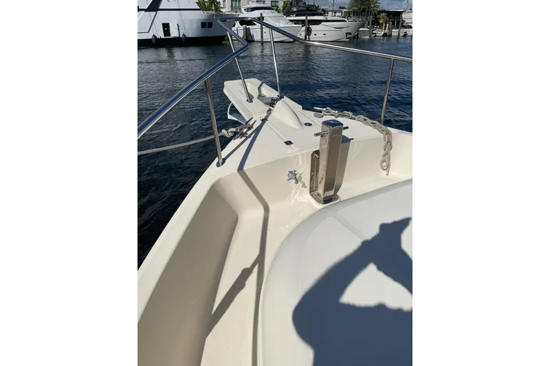 Slide: The Image of Interior of 2008 Mainship 34 Trawler Hardtop with cozy seating and helm station. - 12