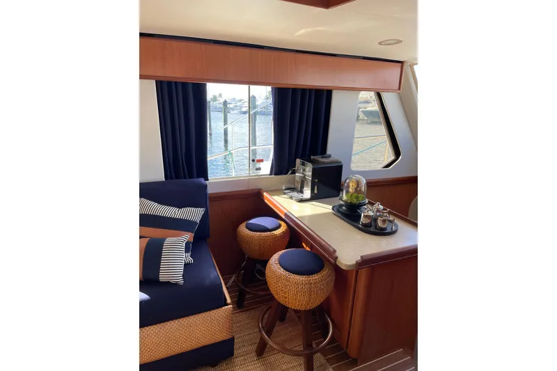 Slide: The Image of 2008 Mainship 34 Trawler Hardtop interior with skylight and clear blue sky view. - 20