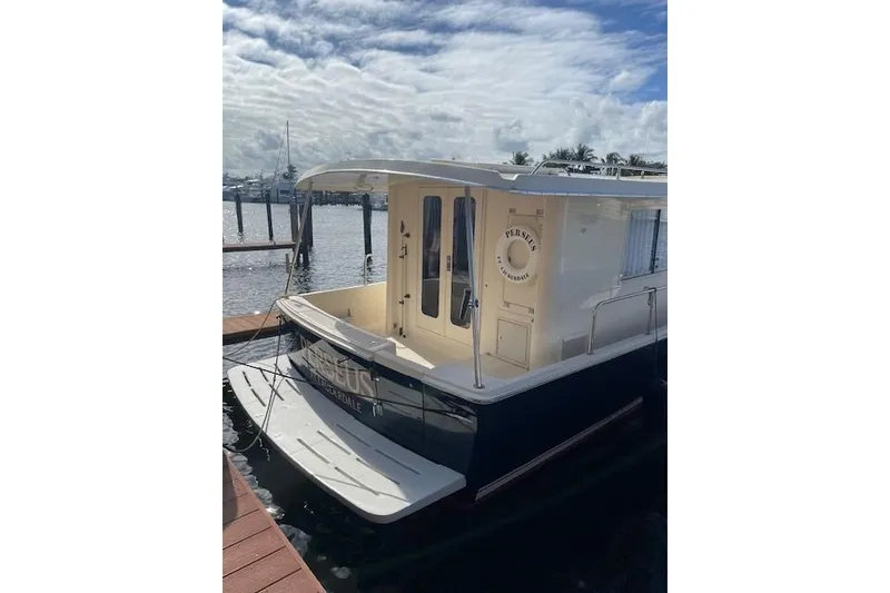Slide: The Image of 2008 Mainship 34 Trawler Hardtop docked in Fort Lauderdale marina. - 4