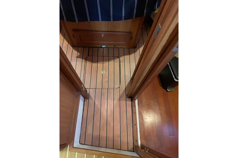 Slide: The Image of 2008 Mainship 34 Trawler Hardtop on dry dock, undergoing maintenance. - 53