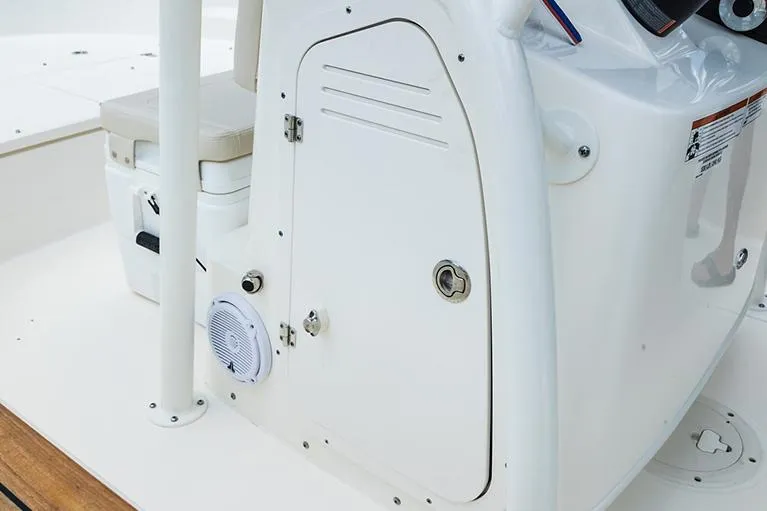 Slide: The Image of Manufacturer Provided Image: 2026 Boston Whaler 190 Montauk boat console with storage compartment and speaker. - 12