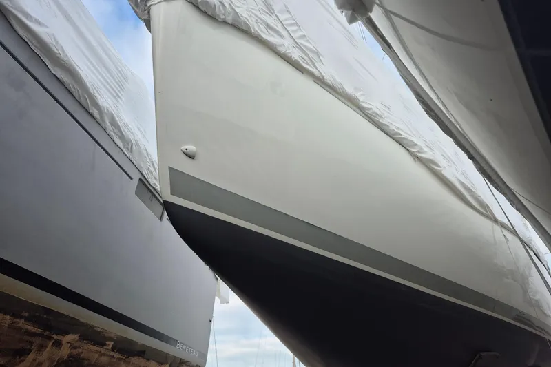 Slide: The Image of Beneteau First 36.7 sailboat, 2003 model, covered and stored, side view. - 8