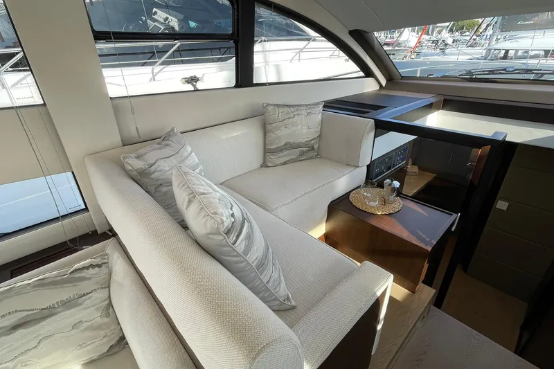 Slide: The Image of Luxurious interior of 2025 Fairline Squadron 50 yacht with elegant seating and decor. - 20