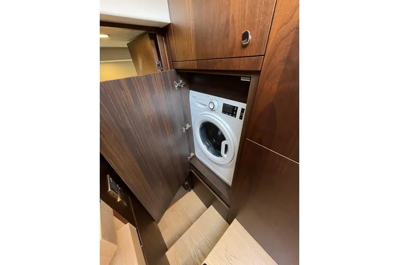 Slide: The Image of Laundry area with washing machine in 2025 Fairline Squadron 50 yacht. - 33