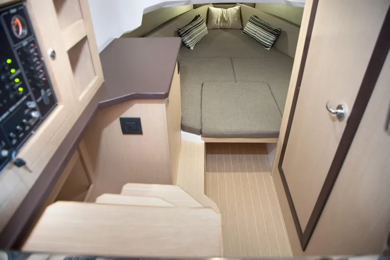 Slide: The Image of Interior cabin of 2025 Ranieri CAYMAN 38.0 EXECUTIVE with cozy bed and modern amenities. - 38