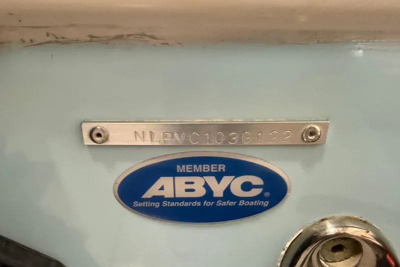 Slide: The Image of 2022 Tidewater 272 CC Adventure boat with ABYC member plaque and serial number. - 18
