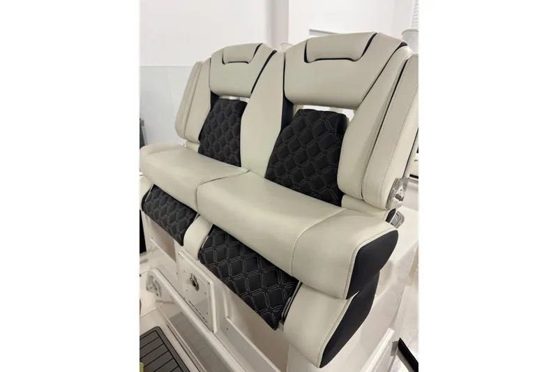 Slide: The Image of Luxurious seating on 2022 Tidewater 272 CC Adventure boat, featuring elegant design and comfort. - 22