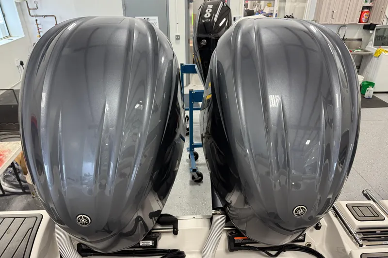 Slide: The Image of Twin Yamaha outboard engines on a 2022 Tidewater 272 CC Adventure boat. - 8