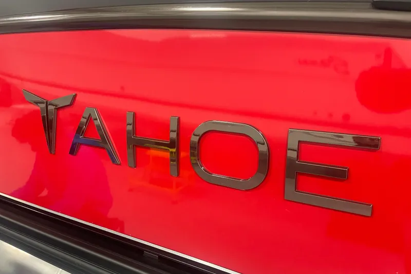 Slide: The Image of 2024 Tahoe Pontoon Cascade Versatile Rear Bench logo on vibrant red background. - 10