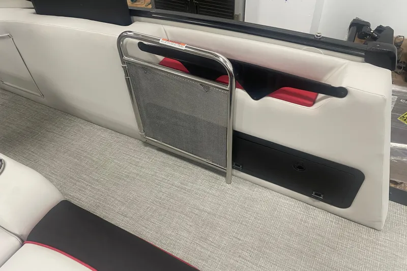 Slide: The Image of 2024 Tahoe Pontoon Cascade Versatile Rear Bench interior with sleek seating and storage. - 26