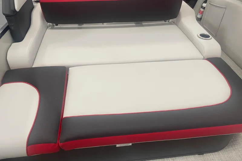 Slide: The Image of 2024 Tahoe Pontoon Cascade Versatile Rear Bench with sleek red and black upholstery. - 27