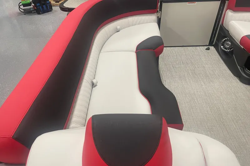 Slide: The Image of 2024 Tahoe Pontoon Cascade Versatile Rear Bench with red and black seating. - 32