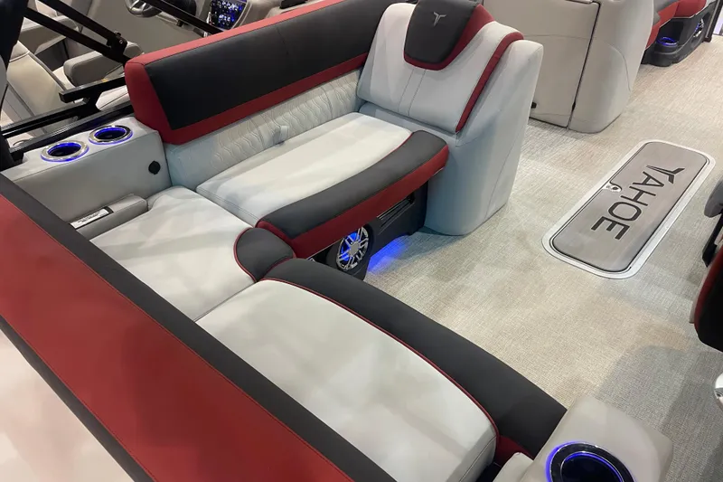 Slide: The Image of 2024 Tahoe Pontoon Cascade Versatile Rear Bench with luxurious seating and illuminated cup holders. - 7
