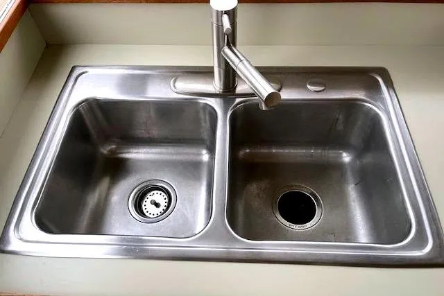 Slide: The Image of Stainless steel double sink in 1984 Bertram 54 Convertible. - 13