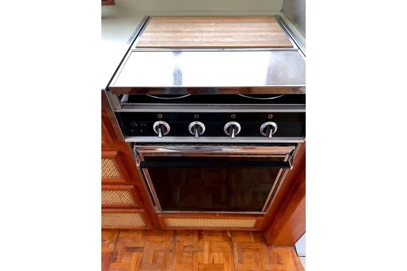 Slide: The Image of Kitchen stove in 1984 Bertram 54 Convertible. - 14