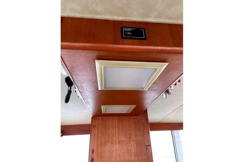Slide: The Image of Interior view of 1984 Bertram 54 Convertible with wood paneling. - 15