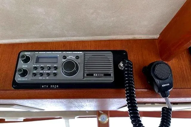 Slide: The Image of ICOM radio in 1984 Bertram 54 Convertible boat. - 17
