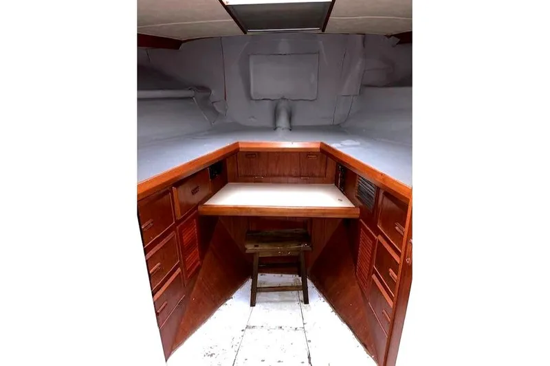 Slide: The Image of 1984 Bertram 54 Convertible interior with wooden cabinetry. - 22