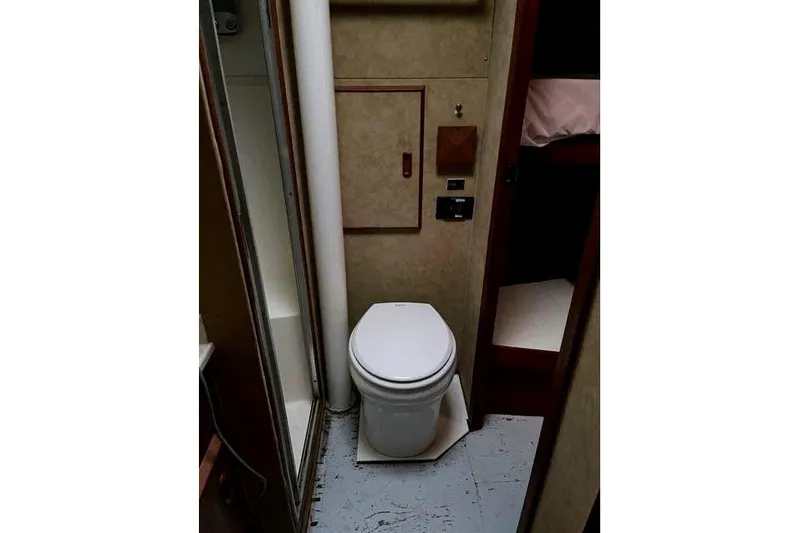 Slide: The Image of Bathroom in 1984 Bertram 54 Convertible yacht. - 28