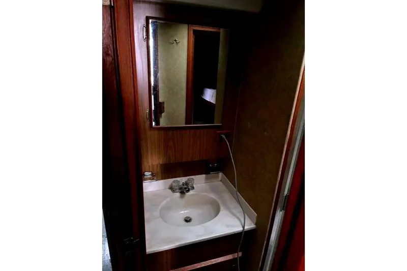 Slide: The Image of Bathroom in 1984 Bertram 54 Convertible yacht. - 29