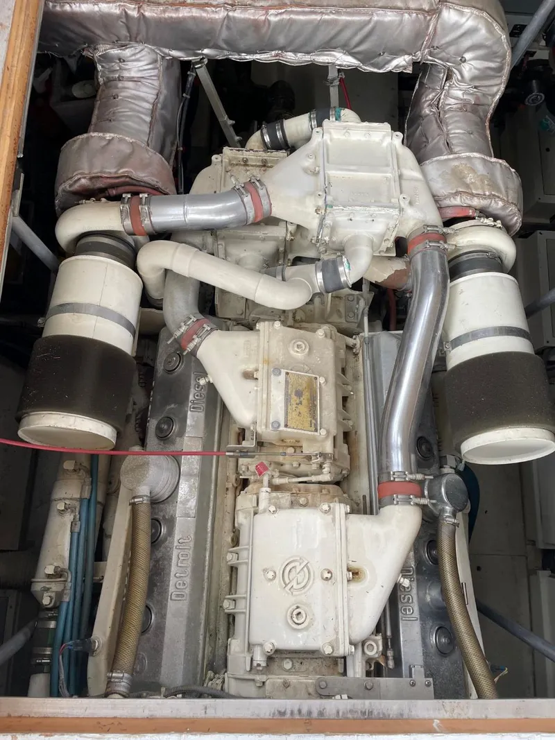 Slide: The Image of 1984 Bertram 54 Convertible engine view, detailed components. - 38