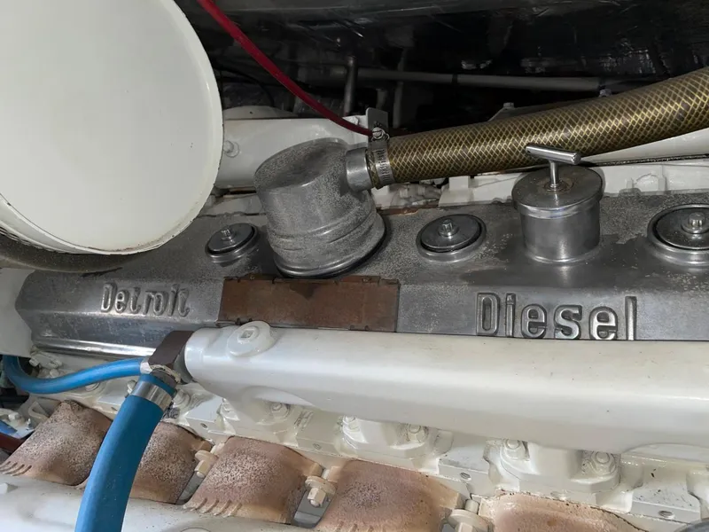 Slide: The Image of 1984 Bertram 54 Convertible Detroit Diesel engine close-up. - 41