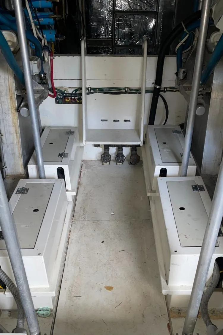 Slide: The Image of Engine room of a 1984 Bertram 54 Convertible boat. - 45