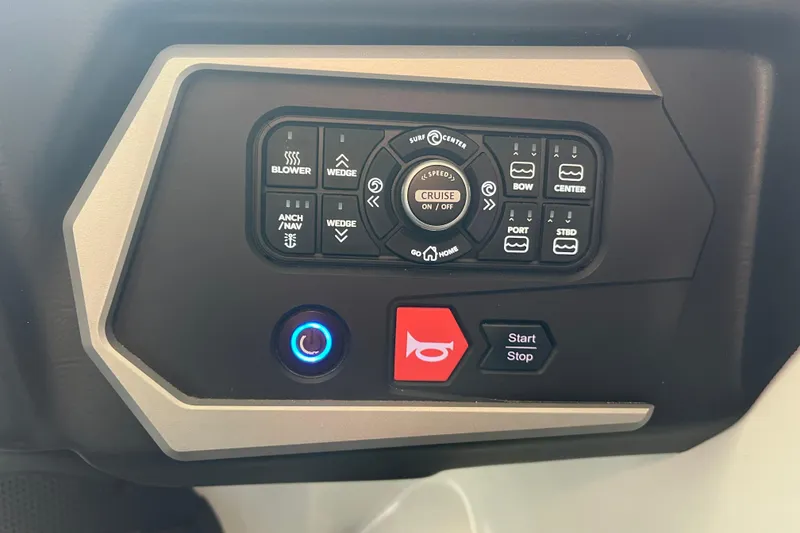 Slide: The Image of Control panel of 2024 Axis T220 boat with various function buttons. - 25