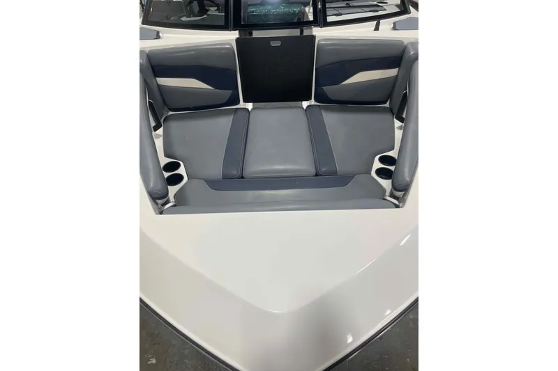 Slide: The Image of 2024 Axis T220 boat interior with gray seating and cup holders. - 30