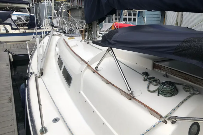 Slide: The Image of 1972 C&C 35 MKI sailboat docked, featuring deck and rigging details. - 2