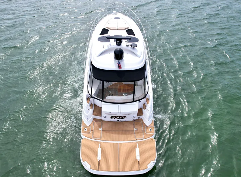 Slide: The Image of 2009 Four Winns V458 yacht on open water, aerial view. - 6