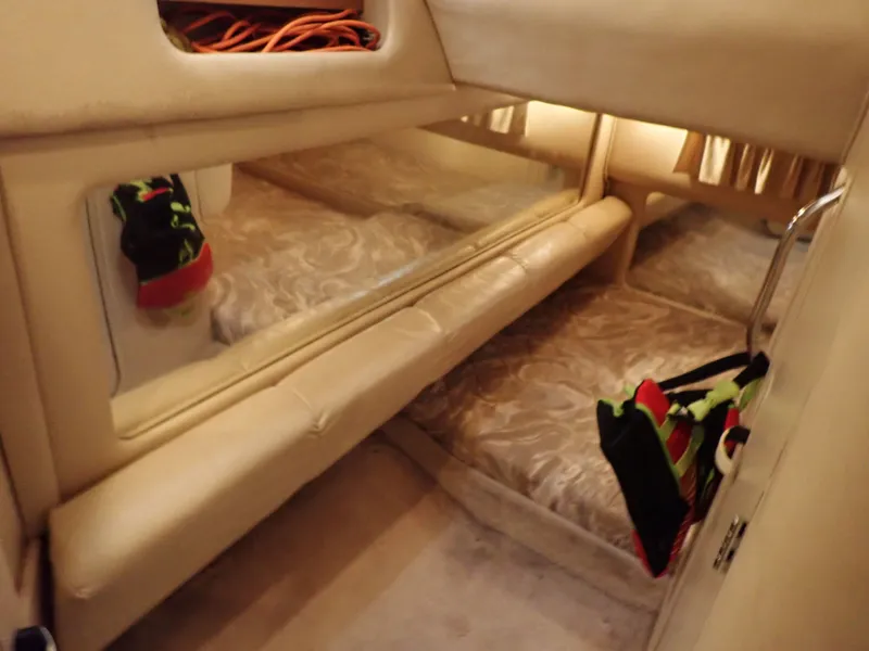 Slide: The Image of Interior of a 1998 Sea Ray Sundancer yacht with sleeping area. - 20