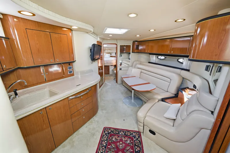 Slide: The Image of Luxurious interior of 2002 Sea Ray 460 Sundancer yacht with elegant wood cabinetry. - 11
