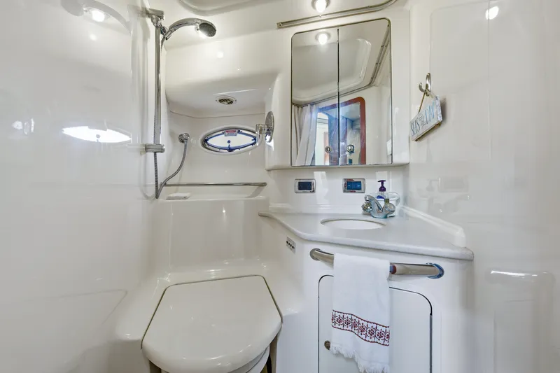 Slide: The Image of Luxurious bathroom in 2002 Sea Ray 460 Sundancer yacht with shower and vanity. - 19
