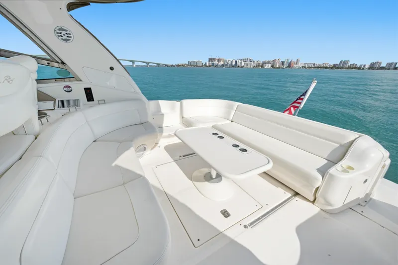 Slide: The Image of Luxurious 2002 Sea Ray 460 Sundancer yacht interior with ocean view and city skyline. - 31
