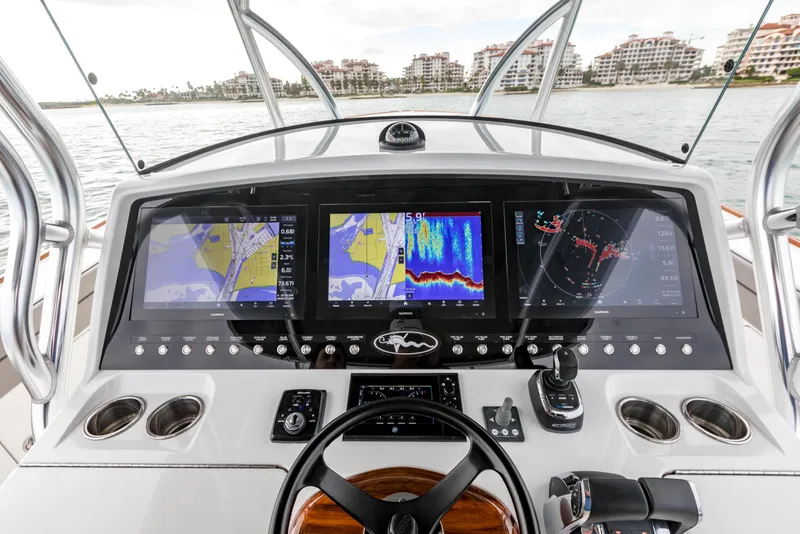 Slide: The Image of 2022 Valhalla Boatworks V-41 dashboard with advanced navigation and control systems. - 11