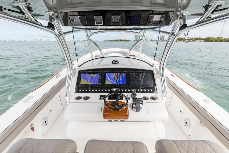 Slide: The Image of 2022 Valhalla Boatworks V-41 dashboard with modern navigation and control instruments. - 12