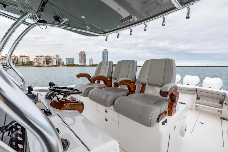 Slide: The Image of 2022 Valhalla Boatworks V-41 helm with luxurious seating and modern controls. - 15
