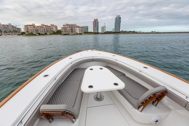 Slide: The Image of 2022 Valhalla Boatworks V-41 cruising near city skyline on a sunny day. - 37