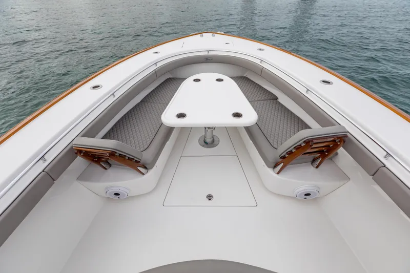 Slide: The Image of 2022 Valhalla Boatworks V-41 cruising in a scenic urban waterway with city skyline. - 38