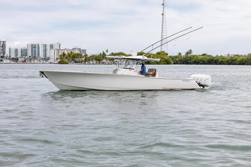 Slide: The Image of 2022 Valhalla Boatworks V-41 cruising in urban waterfront setting. - 4