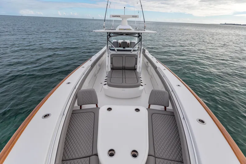 Slide: The Image of 2022 Valhalla Boatworks V-41 cruising in a scenic urban waterway. - 40