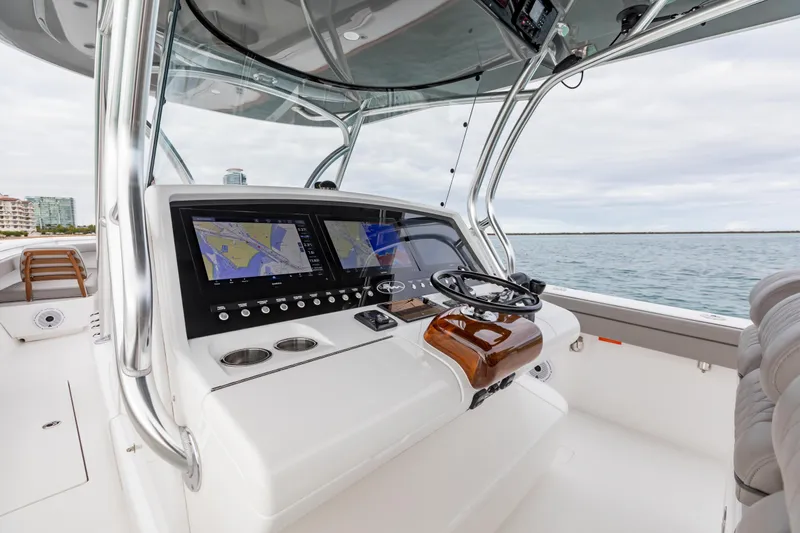 Slide: The Image of 2022 Valhalla Boatworks V-41 helm with dual navigation screens and sleek design. - 9